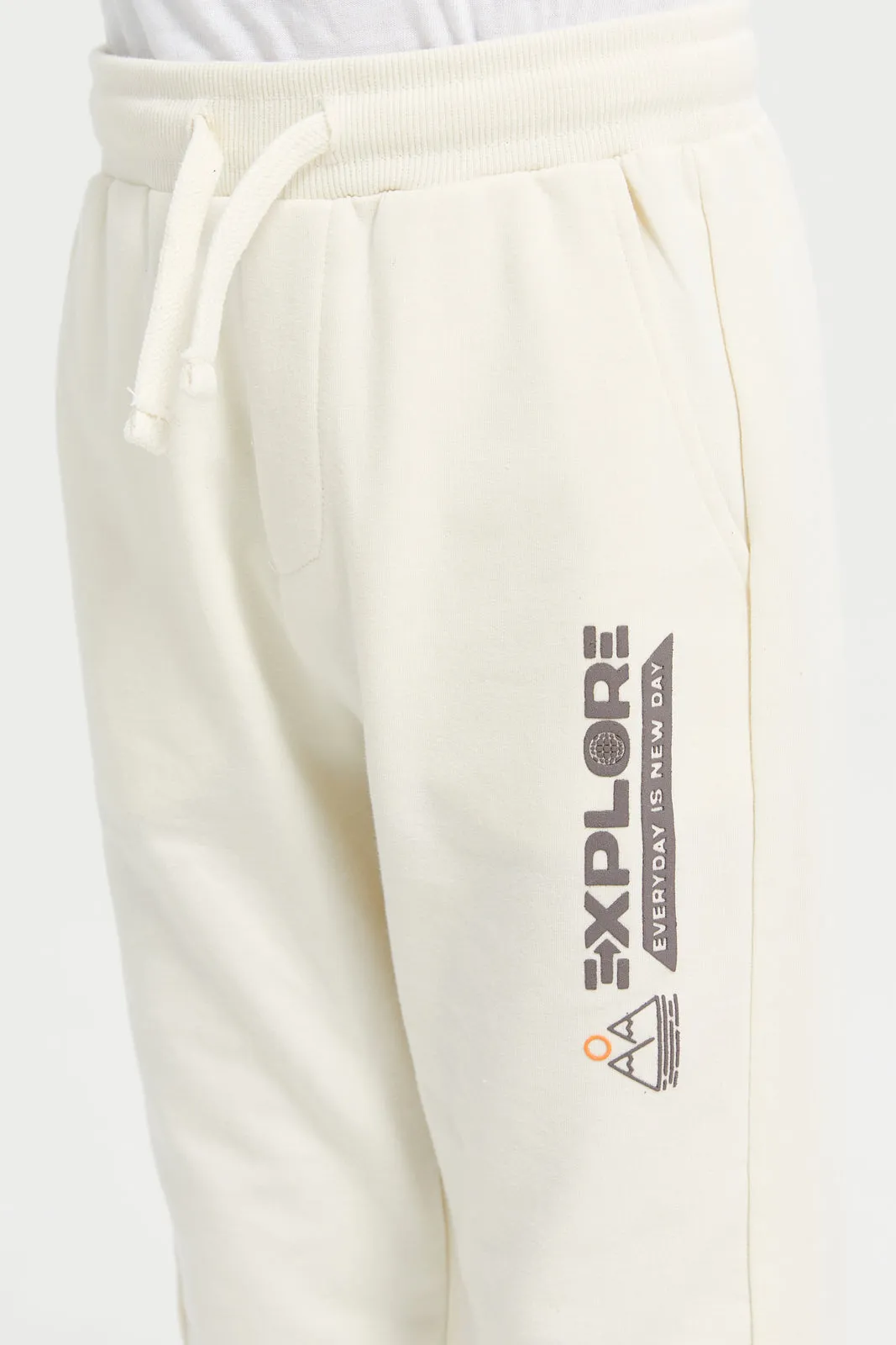 Boys Beige Stretch Printed Track Pants