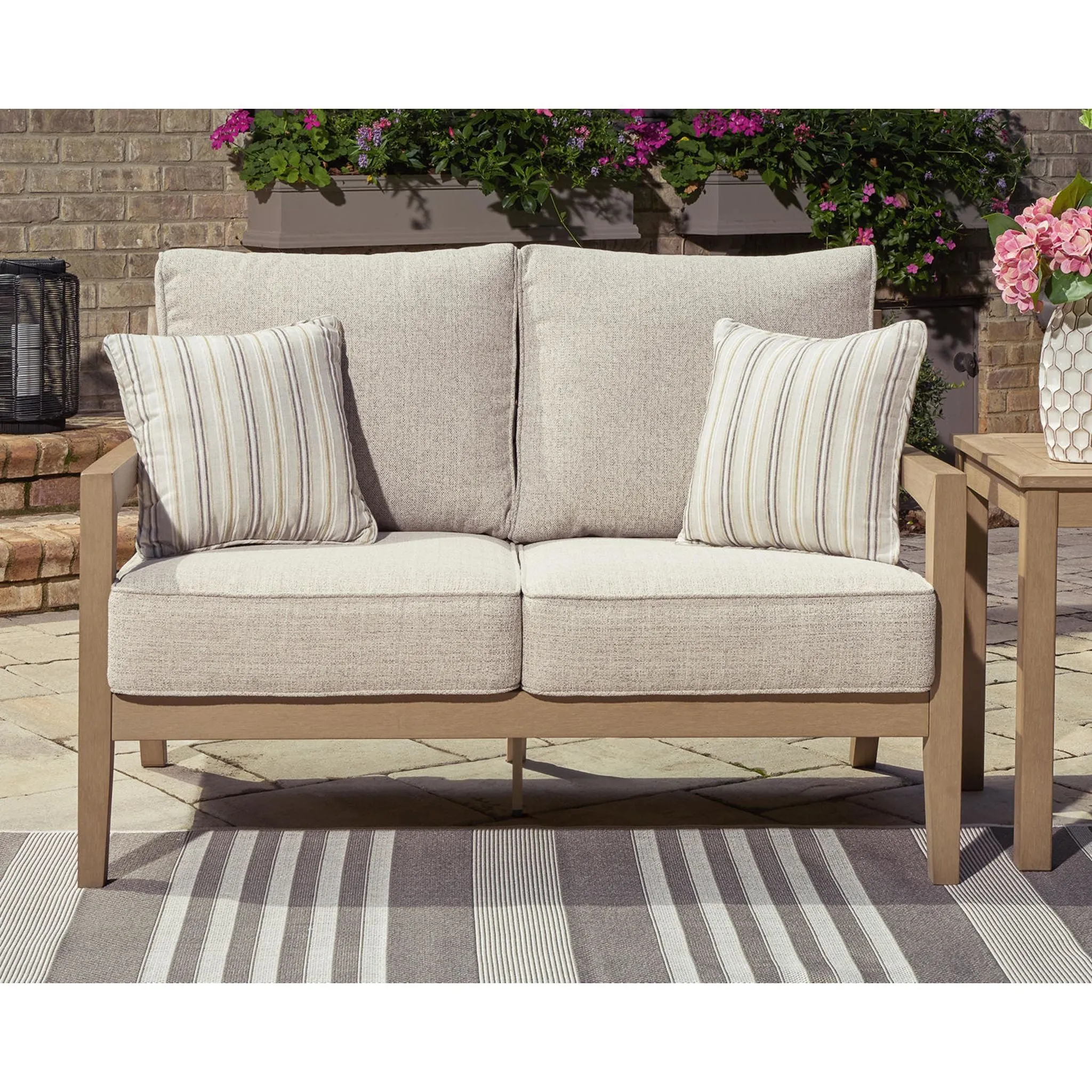 Hallow Creek Outdoor Loveseat with Cushion - Driftwood